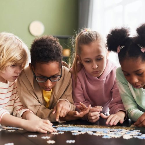 group-of-kids-playing-with-puzzle.jpg