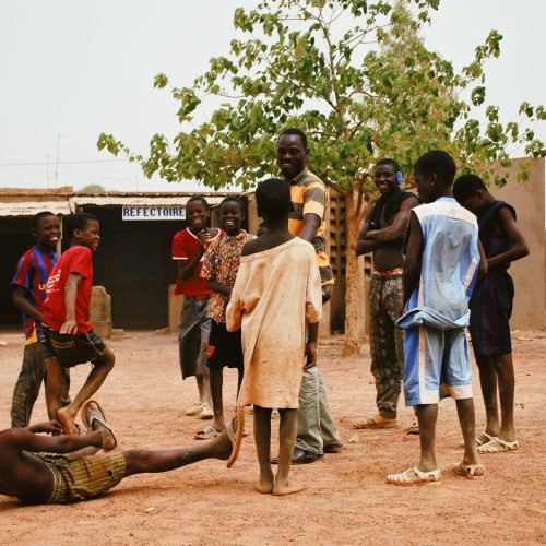 playing-social-skills-game-with-street-children-in-burkina-faso-africa-1.jpg